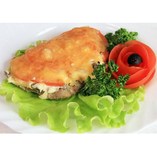 Pork baked with vegetables under cheese
